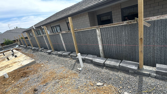 How Retaining Walls Protect and Enhance Sloped Properties